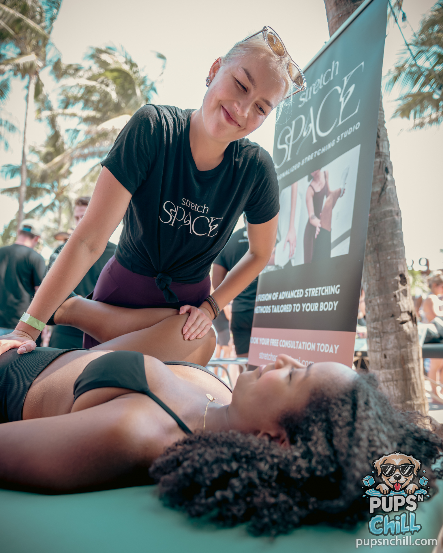 Stretch Space Miami assisted stretching at PupsNChill event